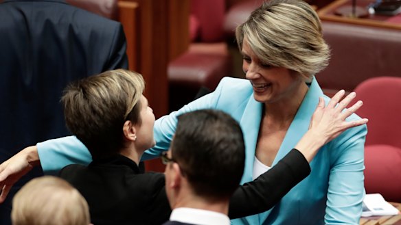 Kristina Keneally is congratulated by Senator Jenny McAllister after delivering her maiden speech in the Senate.