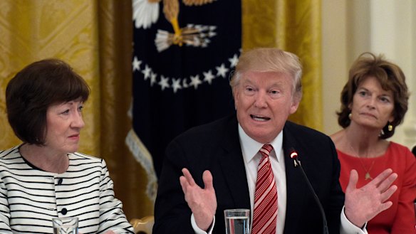 Senator Lisa Murkowsk, right, during a session with Donald Trump in 2017.