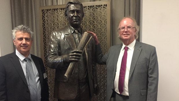 Bronze statue of former lord mayor Clem Jones with sculptor Phil Piperides and Clem Jones Trust chairman David Muir. 