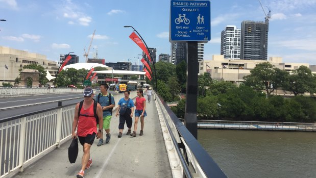Pedestrians and cyclists have to share the pathway at the edge of Victoria Bridge in Brisbane.