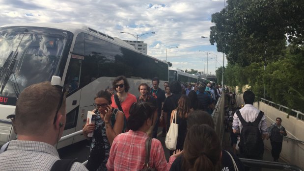 Queues at Clifton Hill station where commuters are boarding replacement buses after delays on the Hurstbridge line. 