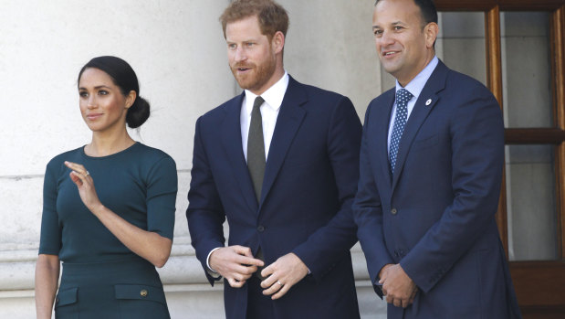 Meghan Markle wears a dark green Givenchy dress to visit the Prime Minister of Ireland's office.