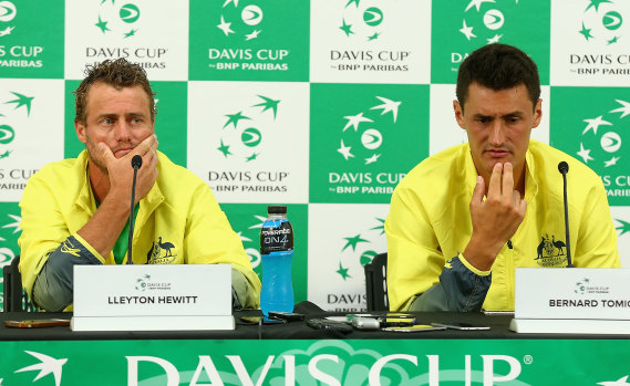 Tomic (right) and former world No.1 Lleyton Hewitt have a complicated relationship.