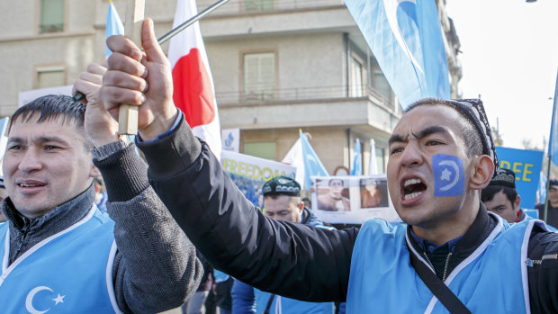 Uyghurs demonstrate against China during the Universal Periodic Review of China by the Human Rights Council in Geneva, Switzerland.