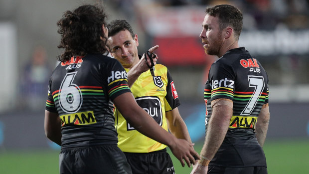 Gerard Sutton sends Jarome Luai (left) to the sin bin during Penrith's golden-point win in Auckland.