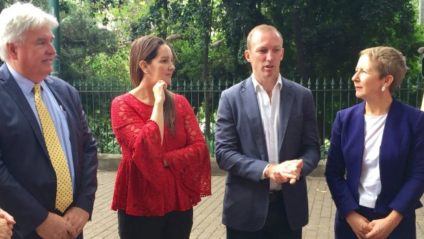 Griffith University domestic violence experts Professor Paul Mazerolle (far left) and Shaan Ross-Smith (middle left) with advocate Darren Lockyer (middle right) and Minister Di Farmer (far right).