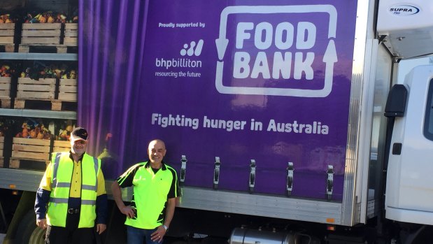 Foodbank staff collect donated supplies from the old hospital. 