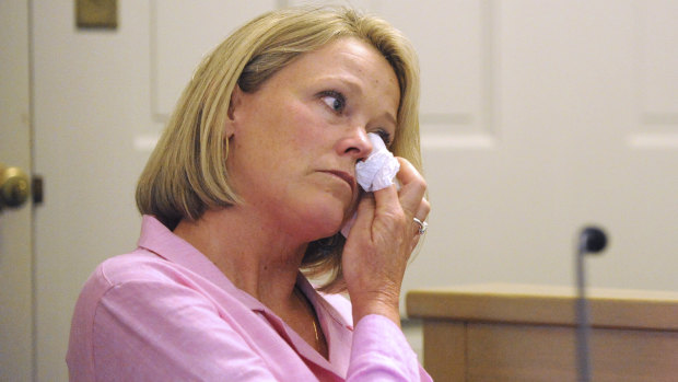 Heather Unruh, a former Boston TV news anchor and the accuser's mother, wipes away tears at the start of her testimony in Nantucket District Court Monday, July 8, 2019.