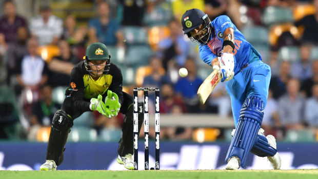 Pressure: Virat Kohli was strangely out of sorts in the first T20 in Brisbane.