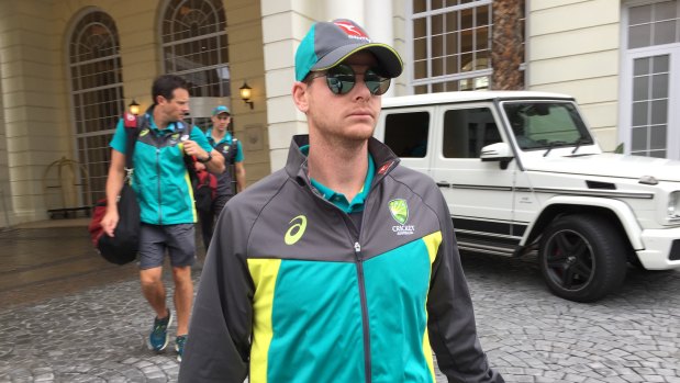 Steve Smith leaves his Cape Town hotel the morning after the ball-tampering scandal broke.