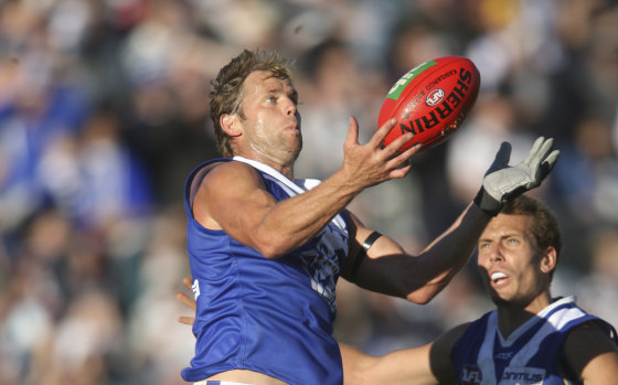 Glenn Archer in his playing days with North Melbourne. 