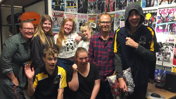 The Woden School teacher Sasha Posthuma-Grbic and youth support worker Luke Ferguson with students who appeared in the video - Genevieve Searson, Octavia Went, Hannah Williams, Joel Dickason and (front) Jacob Brennan and Hayley Simpson.
