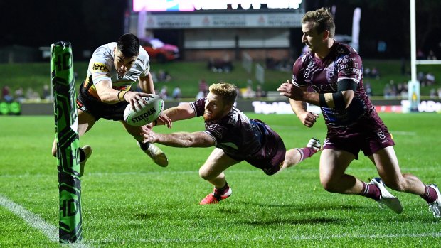 Charlie Staines flies high to cross for a try in the corner, which can easily result in injury.