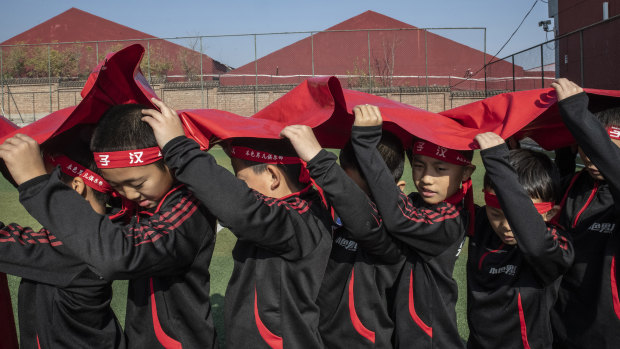 The boys take part in an exercise to teach them about collective effort.