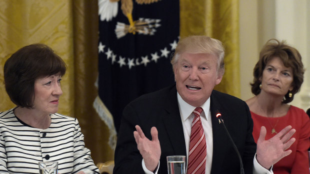 Senator Lisa Murkowsk, right, during a session with Donald Trump in 2017.