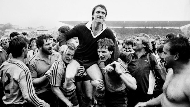 Wallabies captain Andrew Slack is chaired from the Eden Park turf by Michael Lynagh and Simon Poidevin following the 22-9 win.