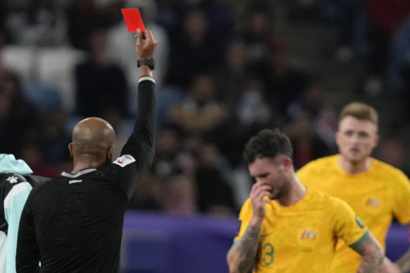 Socceroo Aiden O’Neill is given his marching orders at the Asian Cup.