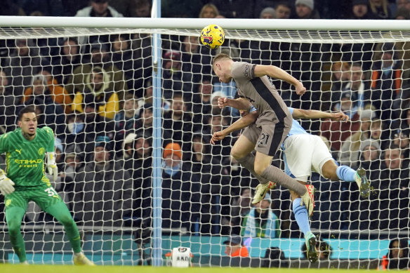 Tottenham’s Dejan Kulusevski, foreground right, scores his side’s third goal during the English Premier League match against Manchester City.