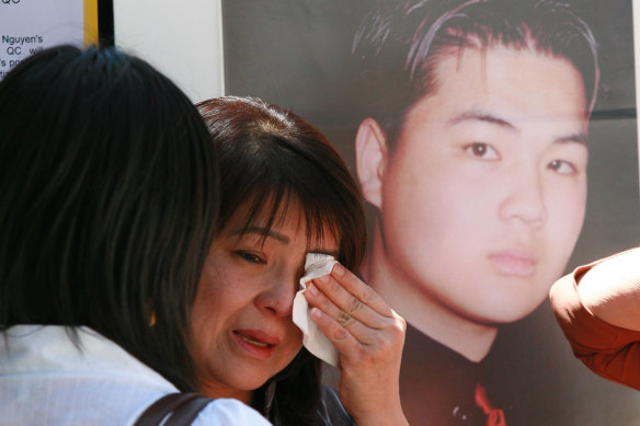 Van Nguyen’s mother, Kim, pictured in front of a photograph of her son in 2006.
