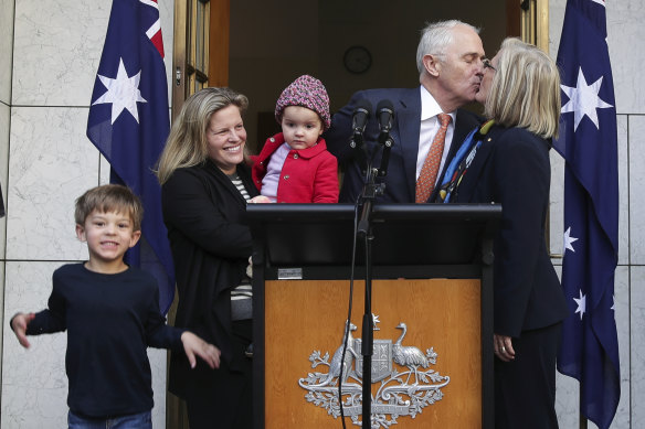 Outgoing prime minister Malcolm Turnbull with wife Lucy, daughter Daisy, and grandchildren Jack and Alice, after the party room meeting.