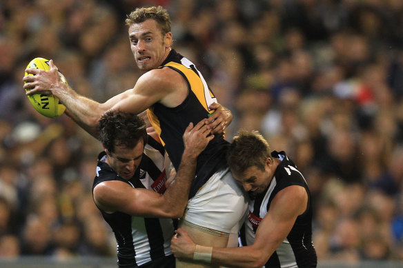 Tuck in action against the Pies in 2012.