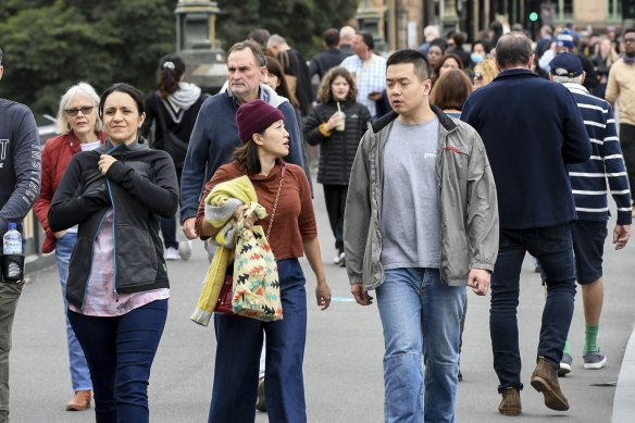 Humming again: crowds on Princes Bridge on the last day of the National Gallery of Victoria’s Triennial exhibition on Sunday.