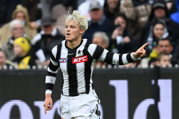 Jack Ginnivan celebrates a goal at the MCG.