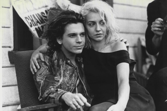 Michael Hutchence as Sam and Post as Anna in Richard Lowenstein's Dogs In Space.