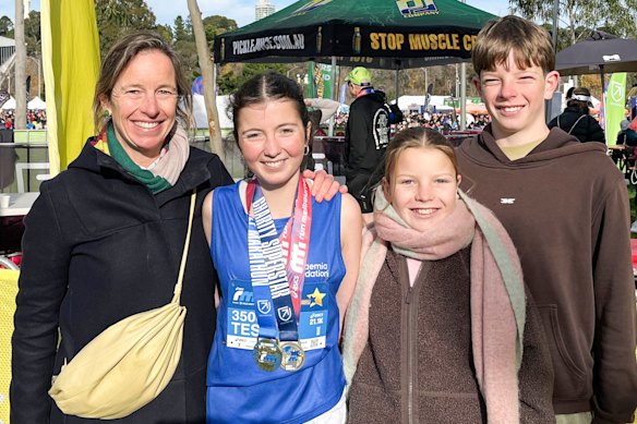 Half-marathon participant Tess Baird, 16, with mother Emily Crane, sister Nell and brother Walter.