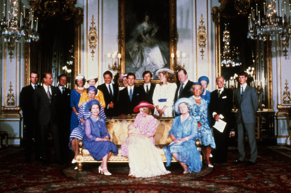 Diana, Princess of Wales, holds baby Prince William as she sits with the Queen and the Queen Mother after William’s christening on August 4, 1982.