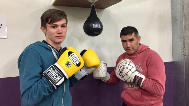 Yass teenager Adriaan Roodt, left, with boxing coach Spider. Adriaan, a student at Campbell High, was tragically killed in an accident on Mount Ainslie.