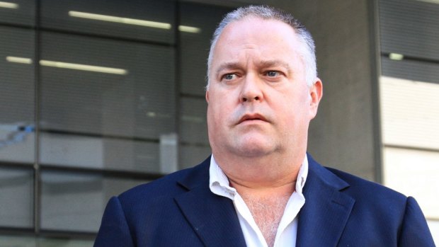 Alleged whistleblower cop Rick Flori leaves the Brisbane Supreme Court.
