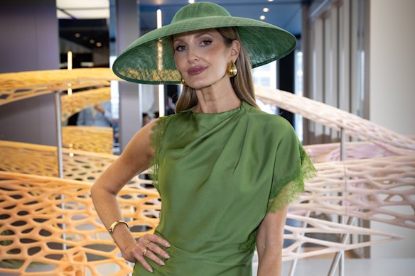 Kate Waterhouse stays dry in the Lexus marquee.