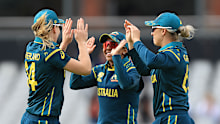 Australia's Ashleigh Gardner celebrates with tea-mates Alana King and Annabel Sutherland.