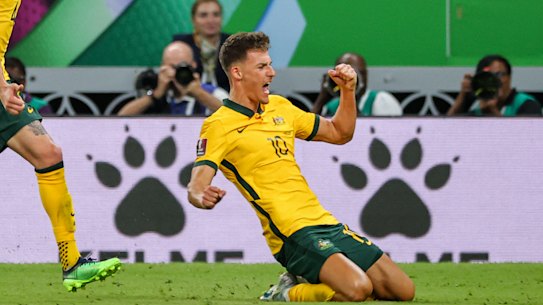 Australia’s Ajdin Hrustic scores the winner against the UAE, setting up a play-off against Peru.