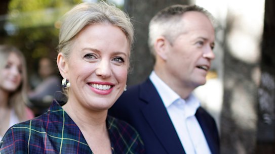 Chloe Shorten and Opposition Leader Bill Shorten depart after a visit to the Salvation Army's Lighthouse Cafe in Melbourne.