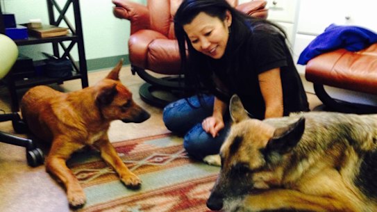 Betsy Arakawa with her dogs Zinna, left, and Bear, in Santa Fe.