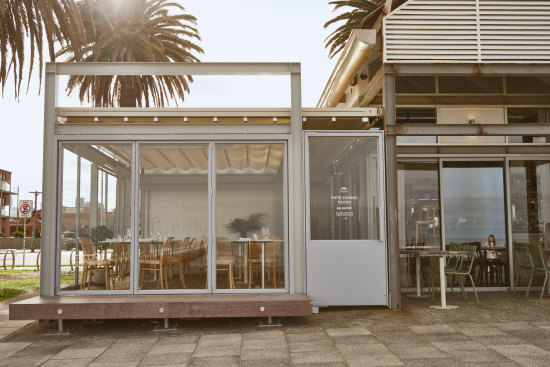 The glass-wrapped kiosk can be found on the Albert Park foreshore.