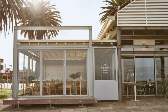 The glass-wrapped kiosk.