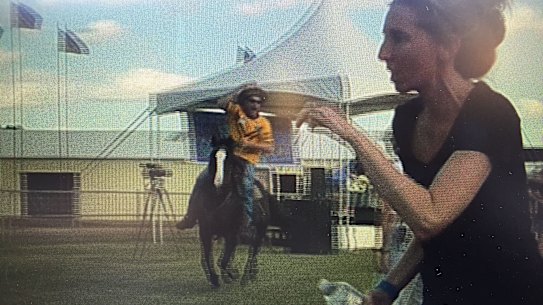 Video taken by an anti-Adani protester of a man riding a horse through Clermont showground.