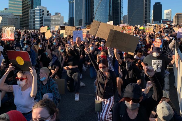 A Black Lives Matter rally in June 2020 spilled from the CBD across Victoria Bridge.