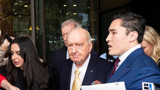 Alan Jones and his lawyer Bryan Wrench outside the Downing Centre Local Court in December 2024.