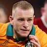 Max Jorgensen of the Wallabies breaks away to score a try.
