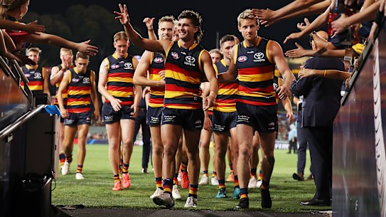 The young Crows leave the Adelaide Oval after an impressive win over Richmond.