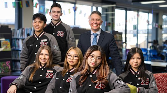 St Albans Secondary College acting principal John Coulson-Silva, pictured with year 12 college leaders. The college is one of Victoria’s top VCE performers among government schools.