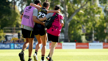 ‘A kick in the gut’: August season start a double blow for some AFLW players