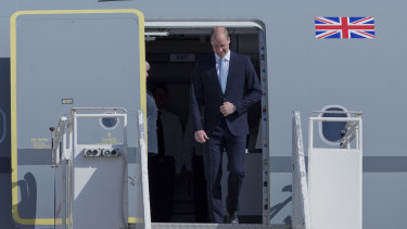 Prince William disembarks from a Royal Air Force plane after landing at the Marka airport in Amman, Jordan.