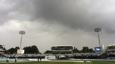 Nothing doing: Rain clouds hang above the pitch at Lord's.