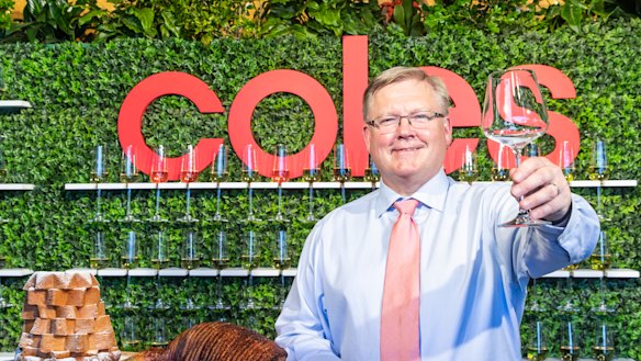 Coles has reported a surprise upgrade to first-half trading, driven by a better-than-expected Christmas trade period.