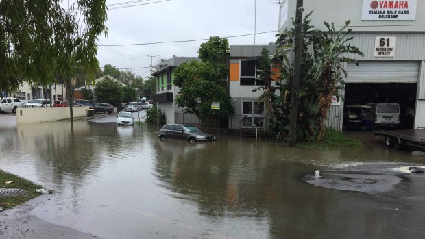 Flash flooding on Didsworth Street, South Brisbane, after heavy rain on Thursday morning.